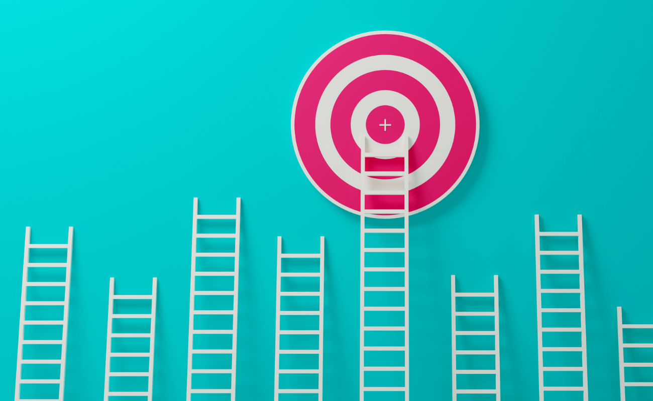 magtyne image_blue bg_pink-white target_white ladders Row of glowing lightbulbs on teal background