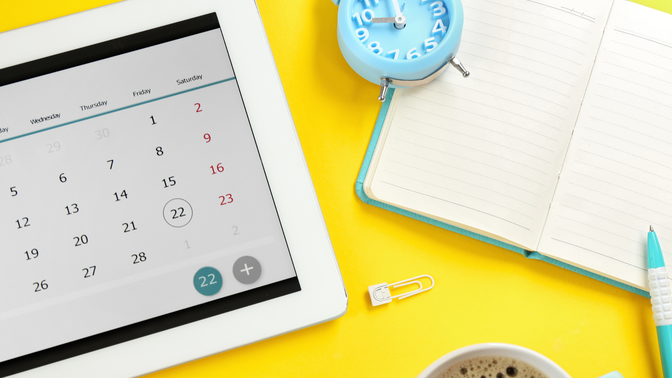 magtyne image_calendar-ipad_notebook-clock_yellow bg Retro yellow typewriter on bright background