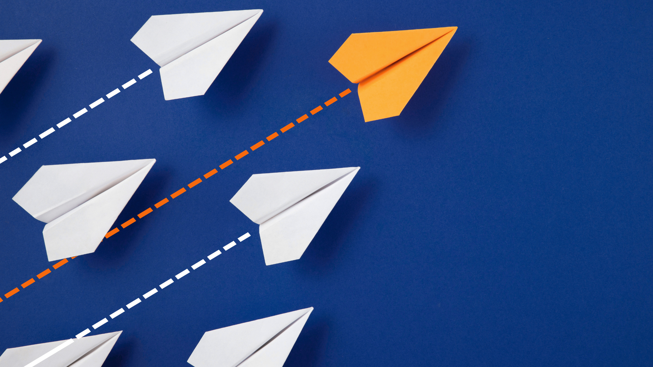 Magtyne Blog Image_Marketing Fails Before Execution Begins Paper airplanes flying in different directions with one highlighted path showing clear direction and alignment